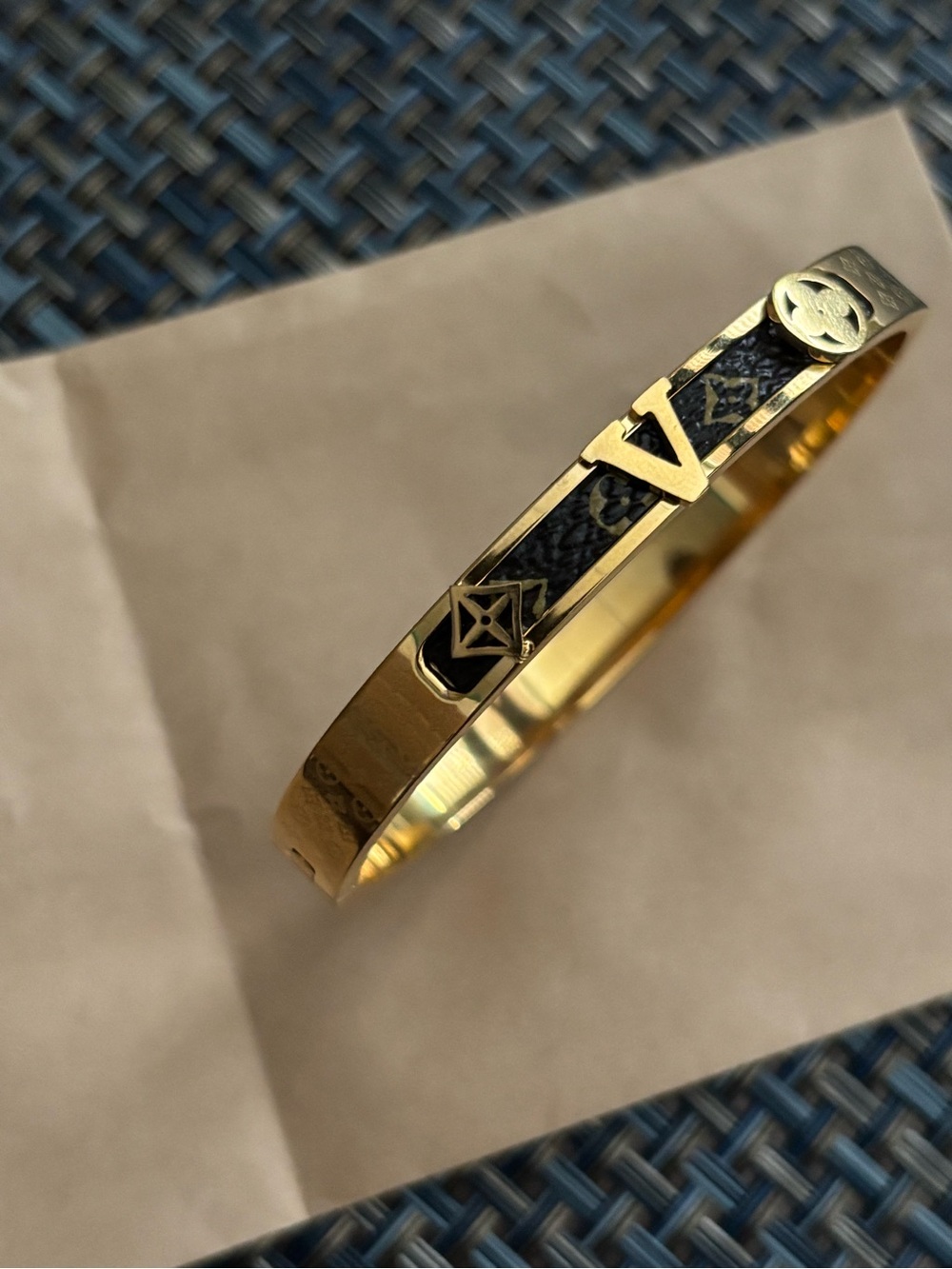 LV Gold-Tone Logo Bangle Bracelet - Black Accent